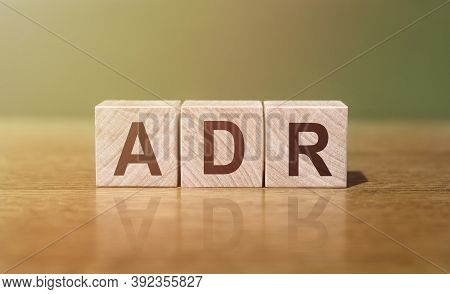 Adr Abbreviation For Adverse Drug Reaction Word Written On Wooden Blocks On A Wooden Table. Medical 