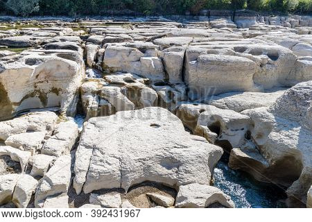 Impressive Rock Formation In The Ain River At Pont De Poitte Village , Jura In France