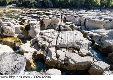 Impressive Rock Formation In The Ain River At Pont De Poitte Village , Jura In France