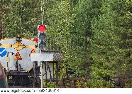 Red Traffic Light During Road Repair Or Traffic Jams. Traffic Laws. Transport And Car Driving.