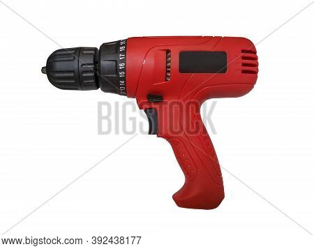 Red Screwdriver Or Drill Isolated On A White Background. Red Screwdriver On A White Background
