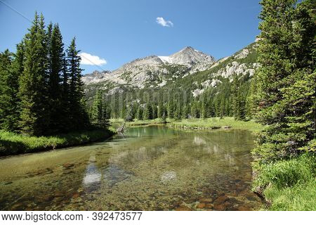 West Fork Rock Creek Flowing In Beartooth Mountains, Montana
