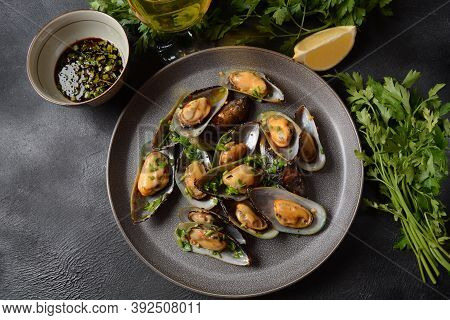 Classic French Meal Moules Marinière  Marinara Mussels With Garlic, Sauce, Lemon And Parsley.