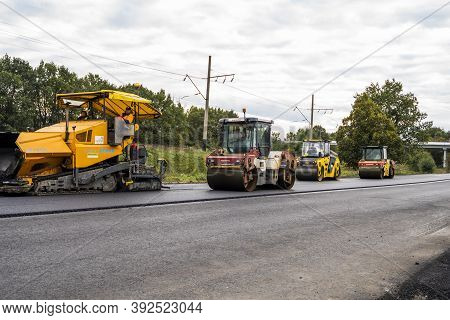 Kyiv, Ukraine - September 25, 2020: Two Heavy Asphalt Road Roller With Heavy Vibration Roller Compac