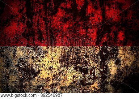 Monaco, Monacan Flag On Grunge Metal Background Texture With Scratches And Cracks