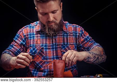 Leather Worker Produces Leather Goods At The Leather Shop