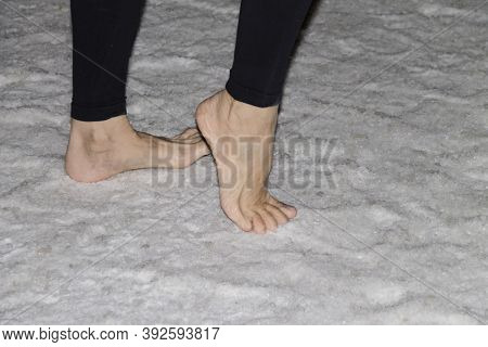 Barefoot On A Layer Of Salt Layer