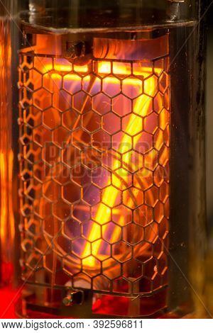 7, Nixie Tube Showing Seven Red, Macro Shot