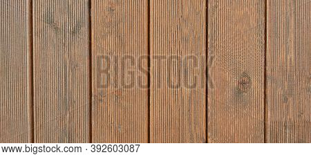Background From Vertical Brown Wooden Planks Decking. H