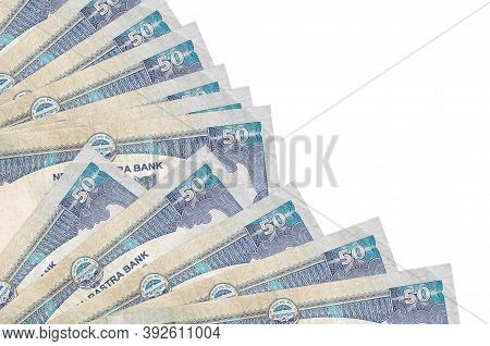 50 Nepalese Rupees Bills Lies Isolated On White Background With Copy Space Stacked In Fan Close Up