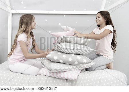 Girls Happy Best Friends In Pajamas With Pillows Sleepover Party. Soulmates Girls Having Fun Sleepov