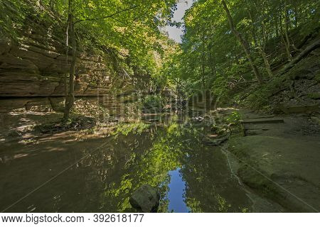Shaded Green Canyon In The Summer In Matthiessen State Park In Illinois