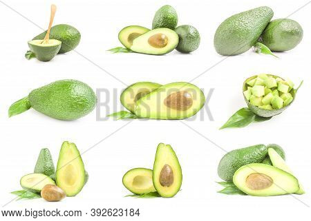 Group Of Fresh Avocados Isolated On White