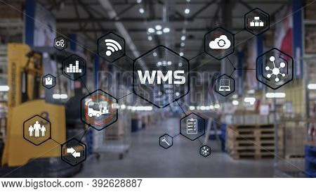 Inscription Wms On Blurred Warehouse Background. Werehouse Management System.
