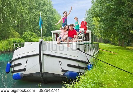 Family Vacation, Summer Holiday Travel On Barge Boat In Canal, Happy Kids And Parents Having Fun On 