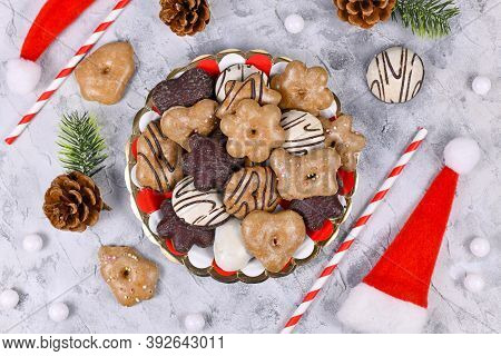 Plate With Traditional German Gingerbread Cookies With Sugar And Brown And White Chocolate Glazing I