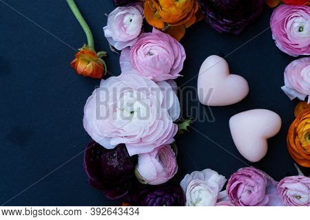 Buds Of Valentines Day Festive Flowers With Two Pink Hearts On Minimal Black Background