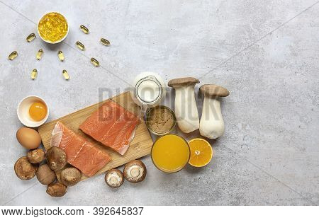 Flat Lay Composition With Products Rich In Vitamin D. Canned Tuna, Mushrooms, Salmon, Eggs, Milk, An