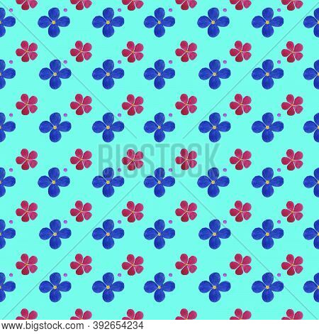 Pattern Of Small Watercolor Flowers Of Blue And Pink Flowers On A Blue Background