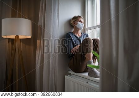 Woman Indoors At Home Feeling Stressed, Mental Health And Coronavirus Concept.