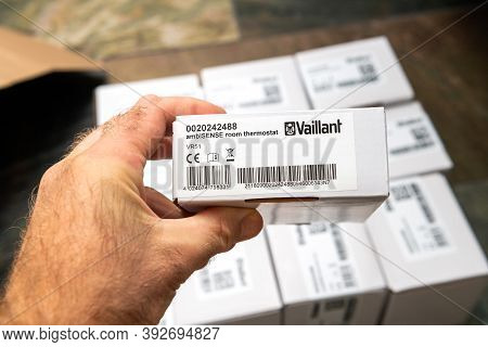 Paris, France - Oct 25, 2020: Pov Male Hand Showing Package Above Multiple Vaillant Ambisense Vr51 R