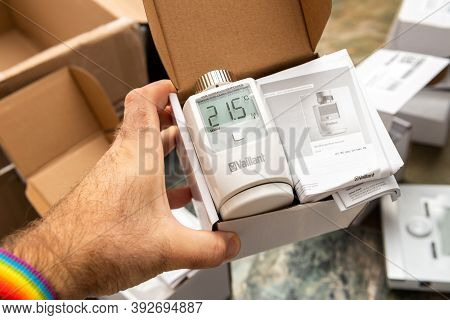 Paris, France - Oct 25, 2020: Pov Male Hand Showing An Unboxed Package Of Vaillant Ambisense Vr50 Th