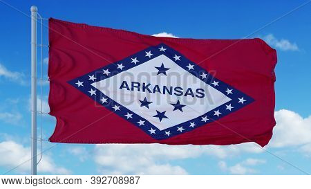 Arkansas Flag Waving In The Wind, Blue Sky Background. 3d Rendering