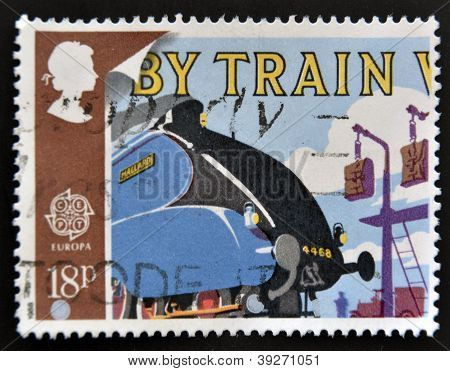 Storbritannien - ca 1988: En stämpel tryckt i Storbritannien visar gräsand och postsäckar på Pick-up