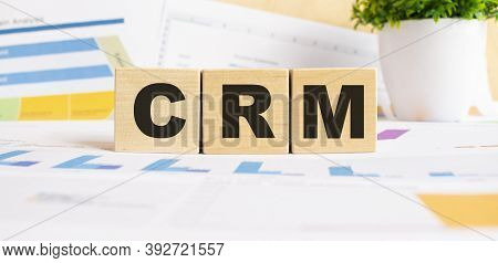 Cpm The Word On Wooden Cubes. Background Is A Business Diagram. Business And Finance Concept