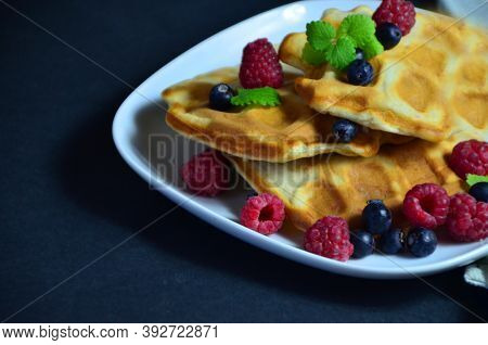 Homemade Belgium Waffles With Fresh Blueberries For Breakfast. White Plate, Viennese Waffles With Ra