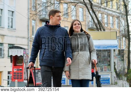 Happy Young Couple Walking With Suitcase Along City Street, Valentines Day, Season Winter Spring, Me