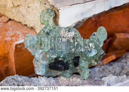 Molten Glass Panes After A Fire In A Building