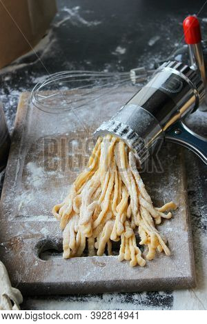 Machine For Cooking Pasta. The Dough For Pasta.metal Machine For Production Of Pasta And Ingredients
