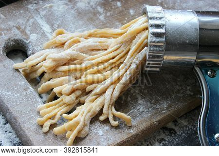 Machine For Cooking Pasta. The Dough For Pasta.metal Machine For Production Of Pasta And Ingredients