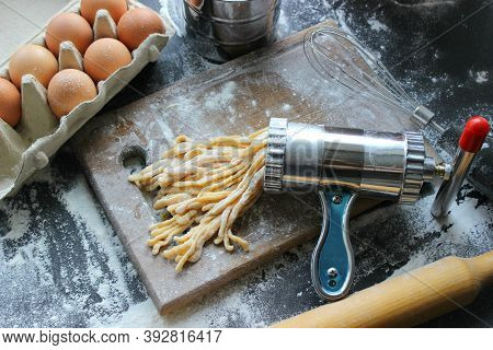 Machine For Cooking Pasta. The Dough For Pasta.metal Machine For Production Of Pasta And Ingredients