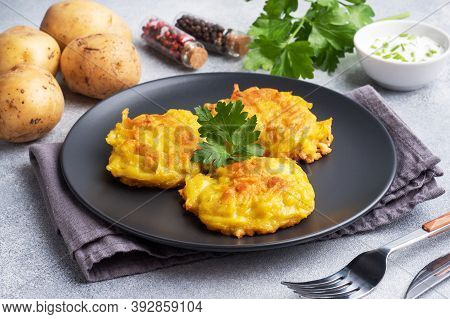 Fried Cakes Of Grated Potatoes On The Plate With Sauce. Traditional Pancakes Boxty Raggmunk.