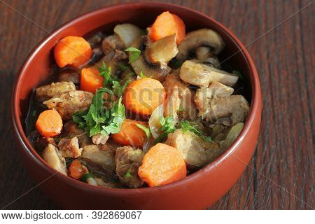Meat Stew With Vegetable On Rustic Wooden Background