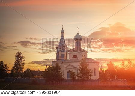 Orthodox Old Church In The Village At Sunset