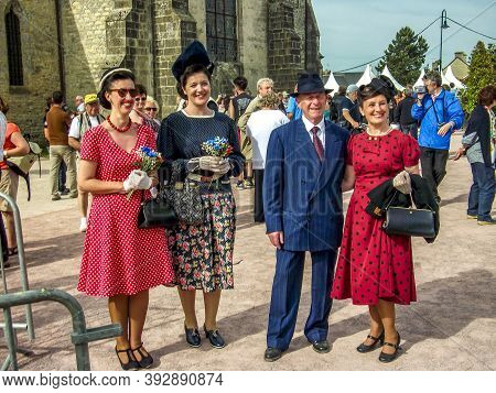 Sainte Mere L'eglise, France - June 6, 2019. Parade Of People Dressed Up In 1940's Clothing Posing I