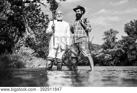 Ready For Fishing. Fly Fishing Adventures. Friends Men With Fishing Rod And Net. Hobby Of Businessma
