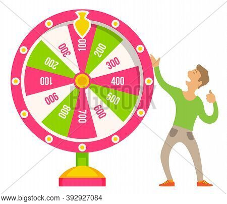Game Fortune Wheel Concept. Man Playing Risk Game With Fortune Wheel And Lottery. Casino And Gamblin