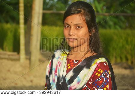 Close Up Of An Indian Bengali Teenage Girl With Long Dark Hairs Wearing Traditional Dress Salwar Kam