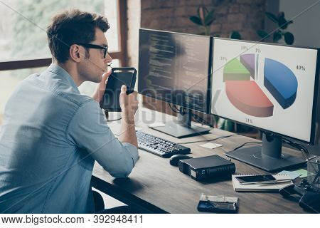 Profile Side Photo Of Focused Guy It Specialist Sit Desk Work Pc Look Charts Analyze Start-up Javasc
