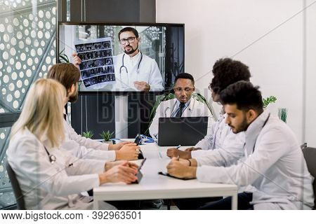 Online Video Conference, Telemedicine, Social Distancing, Webinar Meeting. Team Of Multiethnic Physi