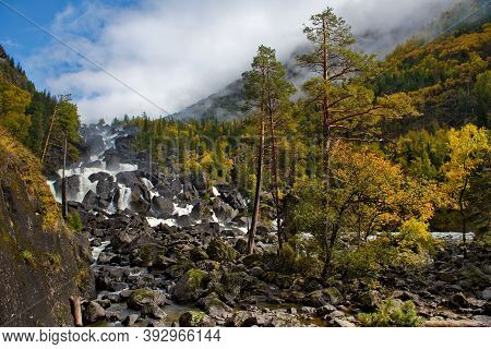 Russia. Mountain Altai. Cascade Waterfall \