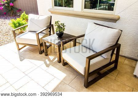Front Porch With Two Arm Chairs & Small Table