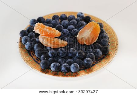 blå bær med mandarin