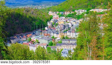 Karlovy Vary City Aerial Panoramic View With Colorful Multicolored Buildings And Spa Hotels In Histo