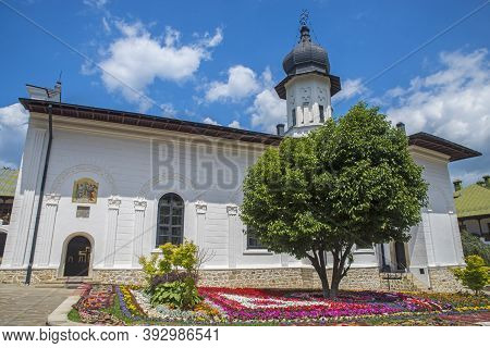 Ancient Monastery Church Of Agapia In A Summer Landscape, Romanian Medieval Landmark