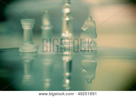 Chess pieces and reflexion